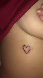 Heart Tattoo On Ribcage Tiny Heart Tattoos Small Heart Tattoos Heart Tattoo