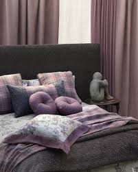 Teal and silver are also natural accent colors to use, particularly if you're going for a chic contemporary look. Purple And Grey Modern Classic Bedroom Christophe Living