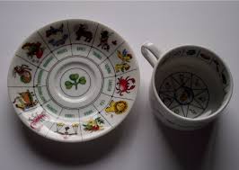 Anything having the form or shape of a saucer v. File Divination Tea Cup Saucer Jpg Wikipedia