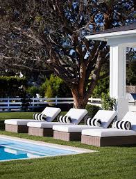 Spacious Beach House With Coastal Interiors Home Bunch An Interior Design Luxury Homes Blog White Exterior Houses Pool Lounge Chairs Pool Houses