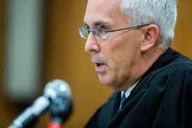 Cristhian Bahena Rivera arrives for his arraignment at the Poweshiek County  Courthouse