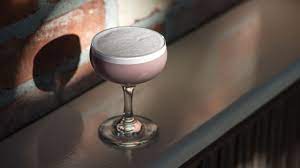 To make the gin fizz add all the ingredients except for the lemon wedge and the sparkling water into a cocktail shaker and shake well. Sloe Gin Fizz Punch
