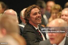 Kevin Sheedy, his wife Geraldine Currie and their family pose for a... News  Photo