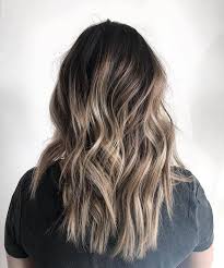 Coloring dark hair can be a hassle, let alone adding streaks! 50 Best And Flattering Brown Hair With Blonde Highlights For 2020