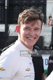 NTT IndyCar series driver Callum Ilott watches in the pits during... News  Photo