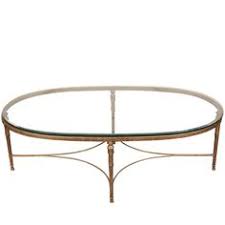 Vintage faux bamboo metal coffee table glass top coffee table mounted on metal base with antique finish. 15 Best Oval Glass Coffee Tables Ideas Oval Glass Coffee Table Glass Coffee Table Coffee Table