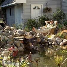 Spread the liner loosely inside the pond; How To Build A Pond And Waterfall In The Backyard Diy