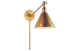 Illuminate a classic book collection, artwork or any element in the home to turn it into a celebrated focal point. Visual Comfort Boston Library Light Antiqued Brass One Kings Lane