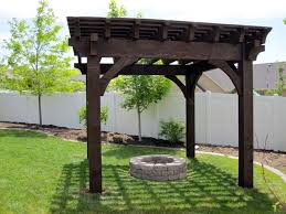 How to add a pergola to outdoor fireplace plans. Install A Diy Timber Frame Pergola Over A Fireplace Or Fire Pit Western Timber Frame