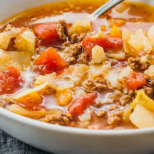 Instant Pot Cabbage Roll Soup With Ground Beef And Tomatoes In A Bowl Great For Low Carb Instant Pot Soup Recipes Soup With Ground Beef Instant Pot Recipes