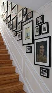 Use this line to position top and bottom corners of two rows of photos. Pin On Staircase Gallery Wall