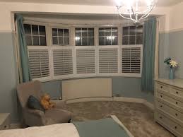 The area required shutters for a bay window and also door area which led out to the courtyard. Bay Window Shutters Woodford London Made To Measure