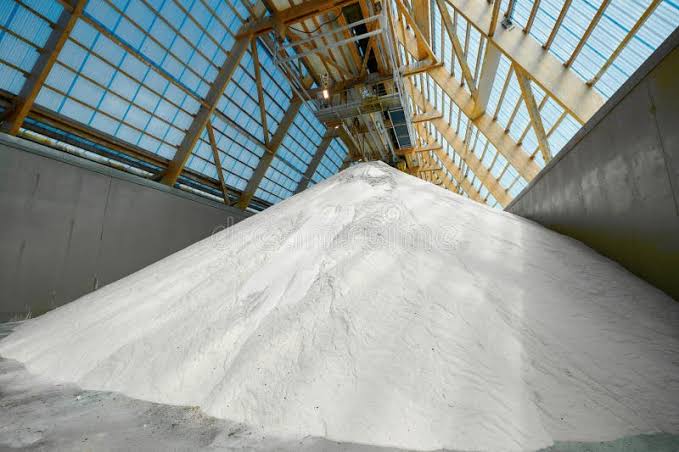 White Powder Bulk Storage in a Chemical Plant Warehouse with Conveyor System Under Natural Light Stock Photo - Image of unloading, chemicals: 353438504
