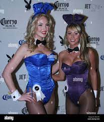 Michelle McLaughlin (L) Miss February 2008 and Sara Jean Underwood Playmate  of the Year 2007 dressed as Playboy Bunnies get ready for the Playboy Super  Saturday Night Party at the Playboy's Desert