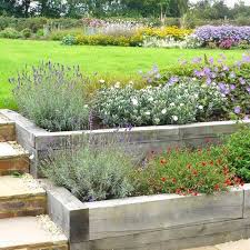 Contemporary Country Garden Design Project In Buckinghamshire Landscaped Raised Beds Railw Sloped Garden Country Garden Design Backyard Landscaping