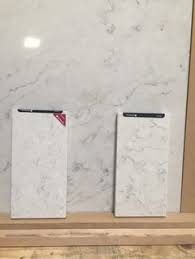 We did not find results for: Carrara Marmi Quartz Counter With White Cabinets