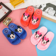 Minnie mouse is a s lender black mouse, with cream face, black nose, long thin tail, black round ears, long eyelashes and pink clothes with white spots. Minnie Mouse Shoes Baby Shoes Aliexpress