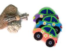 Coaster Done With Beads Pixels Coaster Hama Beads Coaster With Form Of Car Coaster Cars Of Colors Blue Purple And Pink Hama Beads Bead Crafts Hama