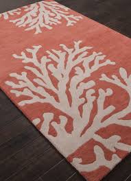 The rich navy blue hues in this coral border navy area rug bring a touch of marine life to your decor style. Coastal Seaside Coral Rug Apricot Coral Rug Beach Cottage Decor Coastal Rugs