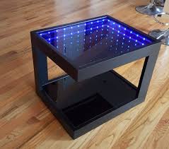 Light luxury marble tv cabinet tea table combination living room set modern simple villa coffee table. Black Coffee Table With Cool Illusion Lights Featuring Infinity Mirror Effect Black Coffee Tables Coffee Table Infinity Mirror