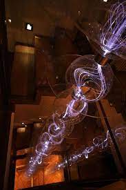 A Cross Between A Cooling Tower And A Van De Graaff Generator Light Art Light Installation Exhibition Design