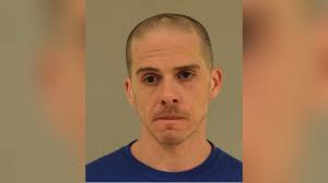 Suspected killer nabbed in freeway chase charged with shooting at police