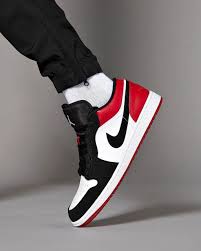 Air Jordan 1 Retro Low Black And White Inspired By Mj S Favorite Colors The Nike Air Jordan 1 Retro Low Black Toe Designed For Dail Shoes Sneakers Jordans Sneakers Men Fashion Air Jordan Sneakers