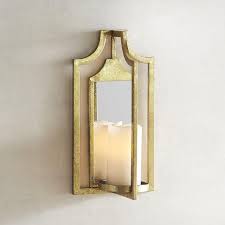 It then has a shelf that holds a glass candle holder. Golden Quatrefoil Candle Holder Wall Sconce