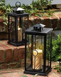 Set Of 2 Black Metal Candle Lanterns From Collections Etc Outdoor Candle Lanterns Garden Candle Lanterns Metal Candle Lanterns