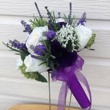 For more information, please email us weddings@realflowers.co.uk or ask your florist to contact us themselves. Brides Bouquet In Purple And Cream Rosie Silk Flowers