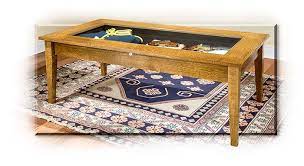 A glass coffee table makes for an elegant, subtle addition to the room, while a coffee table with storage is perfect for creating space for a striking centerpiece. Pin On Reclaimed Vintage Or Replica Furniture