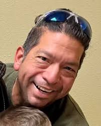 Obituary information for Dr. Enrique C. Ramos