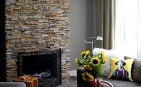 Nothing looks more pleasing to the eyes than a stacked stone fireplace, having fire and light inside, on chilly night, in the home. Natural Stacked Stone Veneer Fireplace Stone Fireplace Ideas