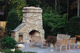 Check out our customer reviews before buying. Outdoor Fireplace And Patio Natural Stone With Re Claimed Barn Stone Arch Re Claimed Wood Box Surround Yoder Masonry Inc