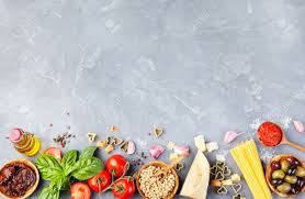 Italienisches Essen Hintergrund Mit Reben Tomaten Basilikum Spaghetti Oliven Parmesan Olivenol Knoblauch Zutaten Auf Steintisch Copy Space Draufsicht Lizenzfreie Fotos Bilder Und Stock Fotografie Image 52327530