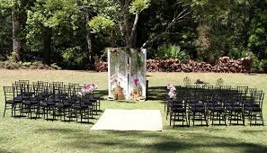 Outdoor Wedding Ceremony With Black Chairs Lilyvale Nsw Wedding Ceremony Chairs Wedding Ceremony Seating Wedding Alters