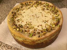 Sprinkle the prepared coconut topping over the center of the cheesecake, leaving a the cheesecake to loosen it from the bottom of the springform pan; My Fiance Just Turned 30 His Request A Pistachio Cheesecake With Coconut White Chocolate Ganache Baking