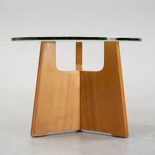 So rest easy, put your feet up. A Swedish Modern Glass Coffee Table Mid 20th Century Bukowskis