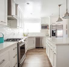 Full overlay cabinets overlay the opening by 1.25 inches on each side. Snow White Maplevilles Cabinetry