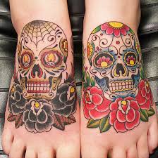 41 Amazing Sugar Skull Tattoos To Celebrate Dia De Los Muertos Candy Skull Tattoo Day Of The Dead Skull Tattoo Sugar Skull Tattoos