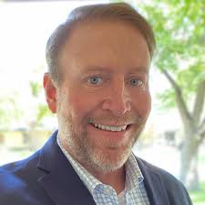 Eric Holmes, Real Estate Agent