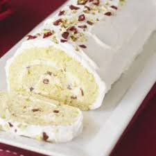Chopped Cranberries And Pistachio Sprinkled On White Buche De Noel Yule Log Recipe Cake Roll Chocolate Roll Cake
