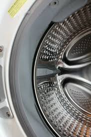 Add your preferred cleaner into a spray bottle and mist the solution over the mold on the gasket. How To Clean A Front Load Washer