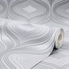 A mottled texture adds a further layer of intrigue to this wallpaper. Alicia Geometric Wave Wallpaper In Silver I Love Wallpaper
