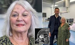 World first: British surgeon removes 'tennis ball-sized' brain tumour  through patients' eyebrow