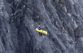 The other victims are the remains of the helicopter have been airlifted off of the mountain (picture: Germanwings Crash Recovery Effort Yields 400 To 600 Body Parts But Force Of Crash Left Not A Single Body Intact On French Alps Mountain New York Daily News