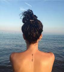 We Love Tattoos On The Back Of The Neck Here At Slinks Hq Arrow Tattoo Slinks Subtle Livelife Arrow Tattoos Back Of Neck Tattoo Spine Tattoos