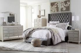 White and silver queen bedroom set. The Coralayne Silver 4 Pc Queen Upholstered Bedroom Collection Available At Dayton Discount Furniture Serving Vandalia Kettering And Springfield Ohio