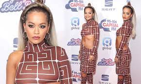 Rita Ora Flashes Her Midriff In A Quirky Cut Out Dress And Matching Boots At Jingle Bell Ball Daily Mail Online
