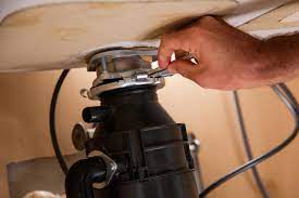 Find out how to remove a knockout plug bef. How To Remove A Garbage Disposal Hgtv